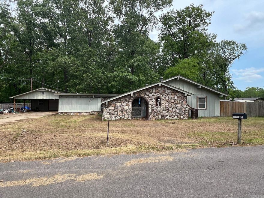 Three Bedroom Two Bath House located in Conway County about 6 miles from Petit Jean State Park.  Property has a fenced yard and a shop