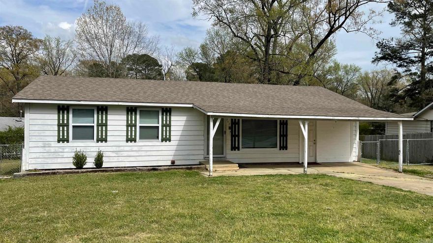 This 3 bedroom 1 bath home is being sold "as is."  It has been rental property for several years.  Roof was put on in August of 2016.  New carpet in 2 of the bedrooms and new vinyl tile in kitchen and living area.  Originally, there was a one-car garage.  Renter installed a wall in the garage and made it into a laundry area and his "man cave." This area is not heated and cooled and is not included in the square footage.  No disclosure.