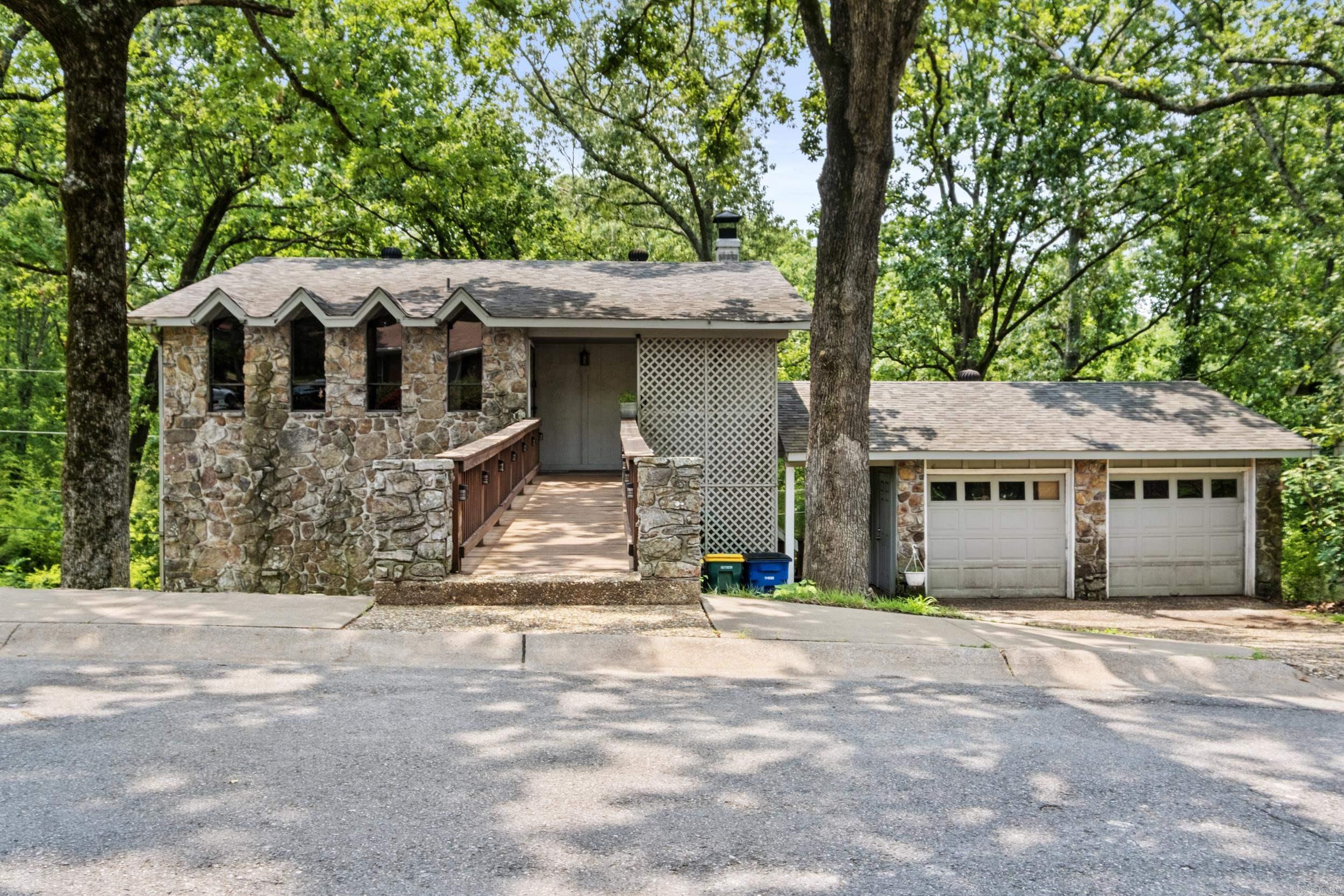 If you’re looking for space, style, and a location that puts everything within reach — this is it! Located in the heart of North Little Rock, this 5-bedroom, 2.5-bath home backs up to a gorgeous green space and the peaceful waters of 5 Mile Creek, offering both convenience and tranquility! Inside, you’ll find a spacious floor plan with five true bedrooms—perfect for growing families, guests, or working from home. The home is designed with comfort in mind, with bright living areas, a Beautiful updated kitchen, and plenty of storage throughout!! But the real showstopper is the backyard: private, scenic, and ideal for morning coffee, weekend barbecues, or simply enjoying nature without ever leaving home. Just minutes from shopping centers, restaurants, parks, and major routes, this home keeps you close to everything!! Schedule your tour today!