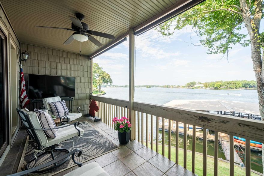 Walk in level unit with Covered Boat Slip/Lift that is selling fully furnished!! This stunning 2 bedroom, 2 bathroom condo at The Moorings complex offers the epitome of lakefront living on Lake Hamilton. Situated in the coveted 7 South area, the prime location is highly sought-after. As you enter the condo, you're immediately struck by the gorgeous views of the lake through the abundance of natural light pouring in. The open floor plan features hardwood floors throughout, creating a warm and inviting ambiance. The living area boasts a cozy wood-burning fireplace, perfect for cool evenings. The spacious primary bedroom is a true retreat with a luxurious en-suite bathroom and walk-in closet. Step out onto the covered patio and take in the breathtaking lake vistas while enjoying your morning coffee or evening cocktails. This unit is a true gem, offering a rare opportunity to own one of the best units in the highly coveted Moorings complex. Adding to the allure, the condo comes with a covered boat slip, allowing you to seamlessly transition from your waterfront oasis to the serene waters of Lake Hamilton. Don't miss your chance to make this slice of paradise your own.
