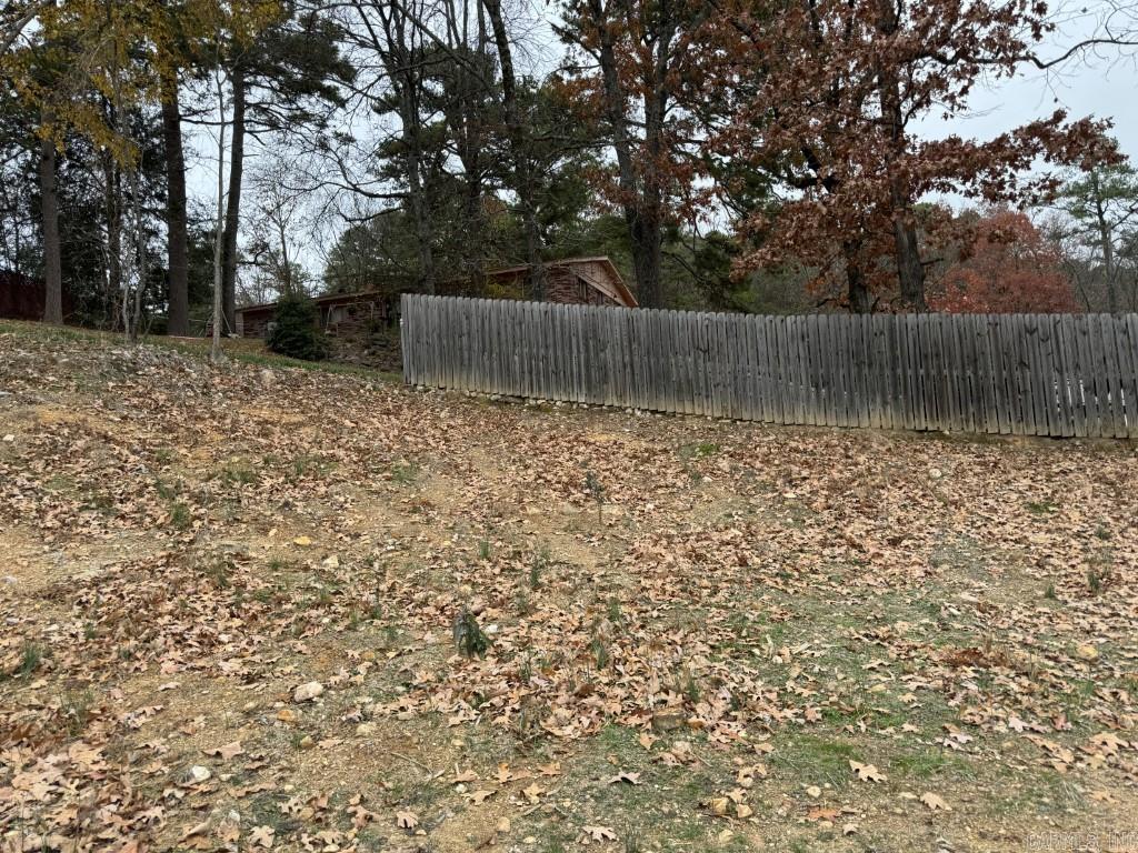 Discover the ideal canvas for your dream home with this generously sized cleared lot in the Rector Heights subdivision. Just minutes away from shopping and medical services, this prime piece of land has been meticulously cleared and leveled for your building convenience. Envision your future home surrounded by the beauty of the quiet neighborhood with a view of West Mountain. Embrace the potential of creating a custom-designed residence, and take advantage of the nearby community amenities, including neighborhood shopping, medical offices, and banking services. With easy access to the MLK By-pass, this lot not only offers tranquility but also ensures convenience in every aspect of your daily life. Discover the architectural possibilities and bring your dream home to life on this exceptional property.
