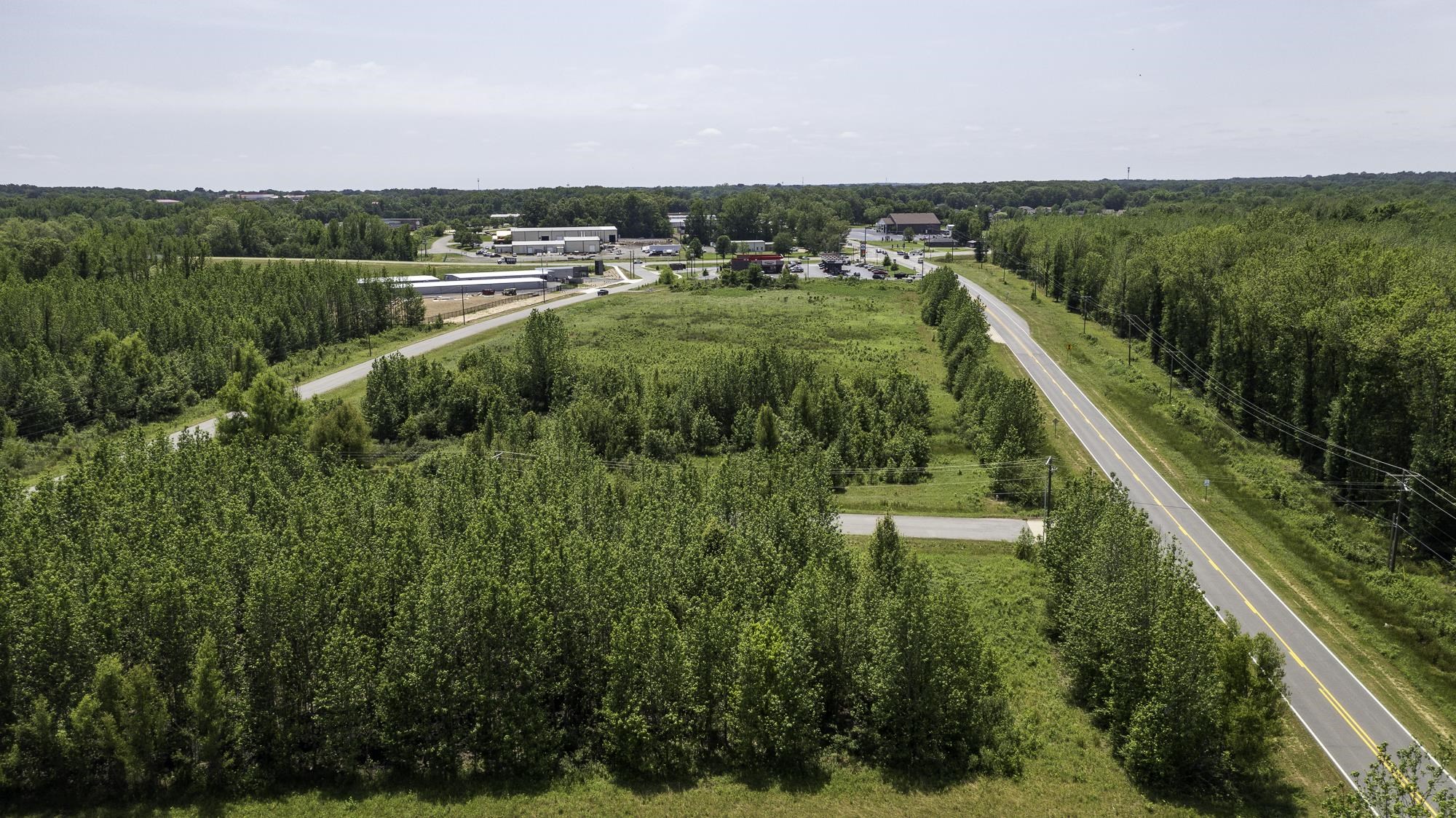 This commercial 10.2 Ac has lots of highway frontage. Zoned I1. City water and sewer available. Next to Cabot Commerce Center where the Valero/Hardees is located. Great access to 67/167 from the new Hwy 38 exit. Call listing agent for more details.