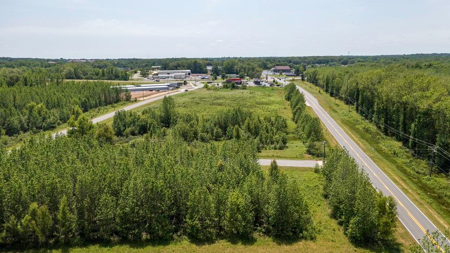 This commercial 10.2 Ac has lots of highway frontage. Zoned I1. City water and sewer available. Next to Cabot Commerce Center where the Valero/Hardees is located. Great access to 67/167 from the new Hwy 38 exit. Call listing agent for more details.
