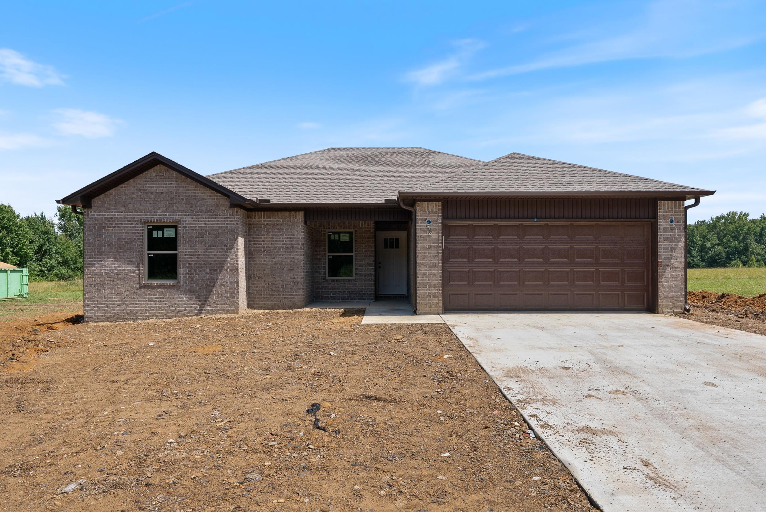 Welcome to this quality, new construction home built by Thomas Long Homes. This home features our Arkansas Plan - a fan favorite - with 3 bedrooms, 2 bathrooms, vaulted, open concept kitchen/dining/living, a great covered back porch, and a separate laundry room! This home is in an RD eligible area - so you could qualify for a $0 down payment loan! The interior features luxury vinyl plank floors throughout, tile shower in primary bath, granite countertops, and more! Minutes from I-57 and close to Highway 319, these homes are great for anyone working in Cabot, Beebe, Little Rock, Conway, or Searcy. We can't wait for you to make this your new home! Agents, please see remarks.