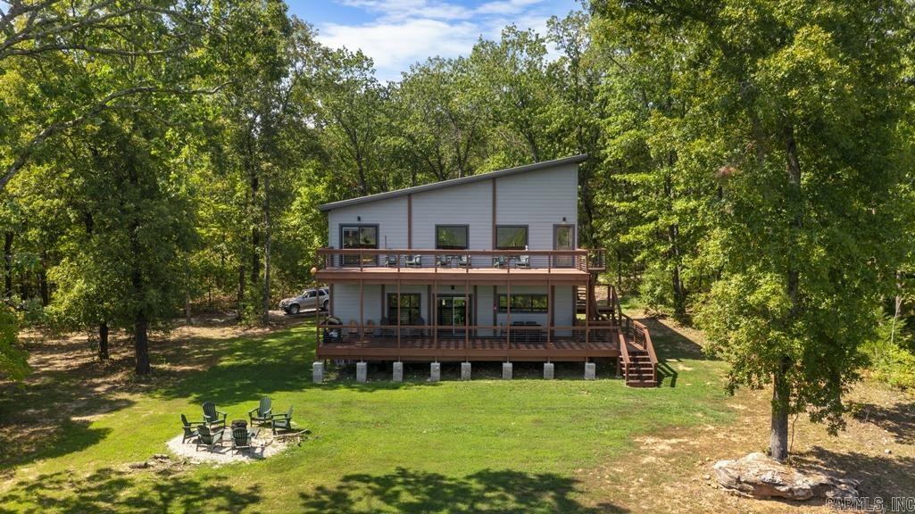 Discover a one-of-a-kind property in the Marble Falls/Erbie area of Newton County. This gated 36.89-acre retreat features a 2,600 sq. ft. custom-built home with 3 bedrooms and 3.5 baths, designed with both comfort and style in mind. Two additional 8’x40’ container cabins (320 sq. ft. each) provide unique guest accommodations and are currently used as nightly rentals. The property borders Buffalo National River Park land, offering unmatched access to thousands of acres of natural beauty and outdoor adventure. Hoskin Creek runs through the property, providing your own private oasis in your backyard. Each home is equipped with county water, electric, and septic. Nearby activities include: canoeing, floating, hiking, waterfall chasing (Hemmed in Hollow, Hideout Hollow, etc), swimming, horseback riding, rock climbing, zip lining, mountain biking, hunting, fishing, and more. Surrounding areas include: Jasper, Harrison, Buffalo National River, Ozark National Forest, and Gene Rush WMA.