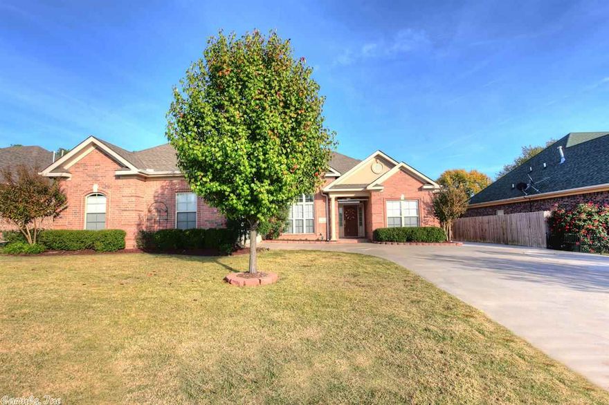 Better than new! Fabulous crown molding thru-out, new tile & carpet, 2" blinds,  & tall ceilings! Living area features gas fireplace while Spacious kitchen has new SS appliances, center island, quartz countertops & pantry closet.  Large master with room for your office in the bay window area!  Dad will love oversized garage with built ins, large doggie door, ceiling fans & heat! Fenced backyard, 10x12 outbuilding, piped gas on patio for grill, & concrete apron on side for camper or boat! A MUST SEE!!