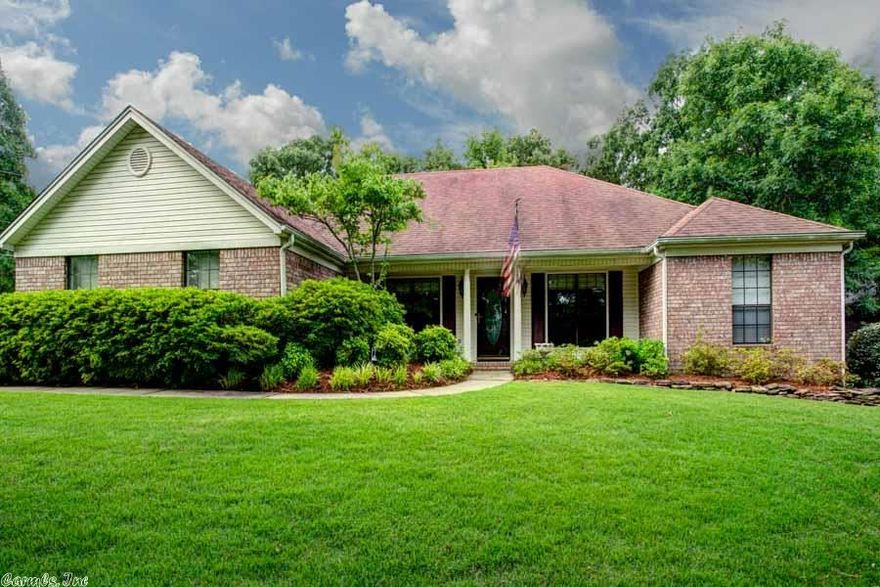 Meticulously maintained, one owner home. This home sparkles! From the gleaming hardwoods through the bright, sunny kitchen to the sunroom (with custom blinds) and lovely landscaped backyard, this house is a gem. Split plan, large open floor plan. Great room along with formal living and dining. Central vac, sprinkler system.  Partially floored attic. Gutter helmets. Outdoor floodlights. Marble surround fireplace. Rug trimmed garage walls so you don't bang your door! This house has it all.