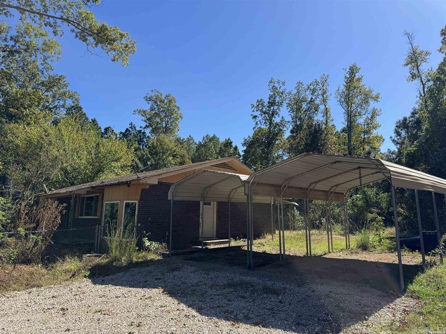 3 bed/2 bath with new SB2 gravel driveway. 2022 Heil HVAC, Windows USA double pain windows 2021 (guarantee transfers), all brick, 2020 dishwasher, solid oak interior doors, 2 carports and all electric. Located right off of Hwy 70E. 5 minutes to downtown Glenwood. 25 minutes to Hot Springs. Wooded lot providing privacy, but close to everything you need. Well house works, but connected to city water. Sits on 0.94 acres. Priced to sell. Selling As-Is. Let's go see this before its gone.