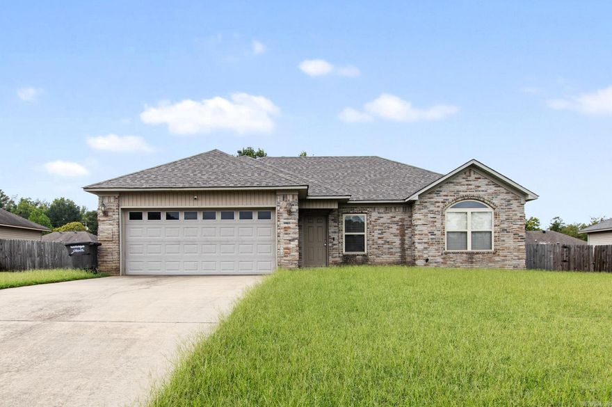 Welcome to 1017 Stevenson Cove, located in a quiet, established neighborhood in Jacksonville. This spacious home features a split floor plan with a separate living room, perfect for entertaining or relaxing by the fireplace. Enjoy built-in surround sound and a large backyard with a patio—ideal for outdoor gatherings. The property sits on an oversized lot and includes a two-car garage for ample storage. Bedrooms need paint and flooring, offering a great opportunity for buyers to customize finishes to their taste. A solid home with great bones, ready for your personal touch. Call for your private tour today!  *Agent see remarks