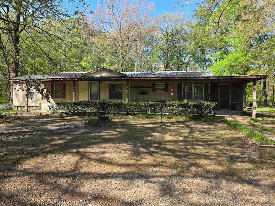 This is such a great property located in Cleveland County with lots of extras.  Plenty of love went into this place and it is just waiting for you to add more.  It has a shop with an overhead door for work projects inside and there is also covered RV parking.  Plenty of places for all your outside toys.  There is a fire pit, barbeque area, dog pen, and a garden spot.  The home is super cozy and has a bonus craft room/possible bedroom.  Give me a call to take a look!