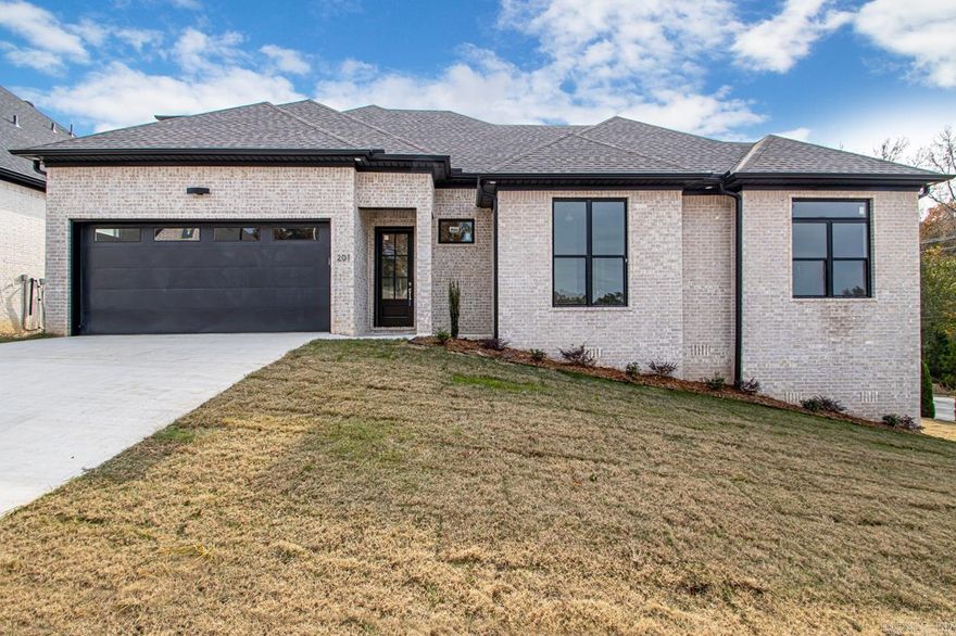 Discover your dream home in the highly coveted Kanis Ridge Estates of West Little Rock! This stunning move-in home features an open-concept design anchored by a gourmet chef’s kitchen with stainless steel appliances, granite countertops, an expansive eat-in island, and pantry. The kitchen flows seamlessly into dining area and an inviting living space with a cozy fireplace--large windows for abundant natural light. The primary suite serves as a true sanctuary, offering a spa-inspired bath featuring a soaking tub, dual vanities, a custom shower, and a walk-in closet. Two additional guest bedrooms share a well-appointed bath. Upstairs you will find  a versatile bonus room or fourth bedroom with its own private bath--perfect for home office or guest quarters. Enjoy peaceful Arkansas evenings on the covered patio. Exceptional storage is provided by walk-out attic space and under-home storage. Minutes to Baker Elementary.  Combining modern style with thoughtful functionality, this home is the perfect choice for your next chapter!