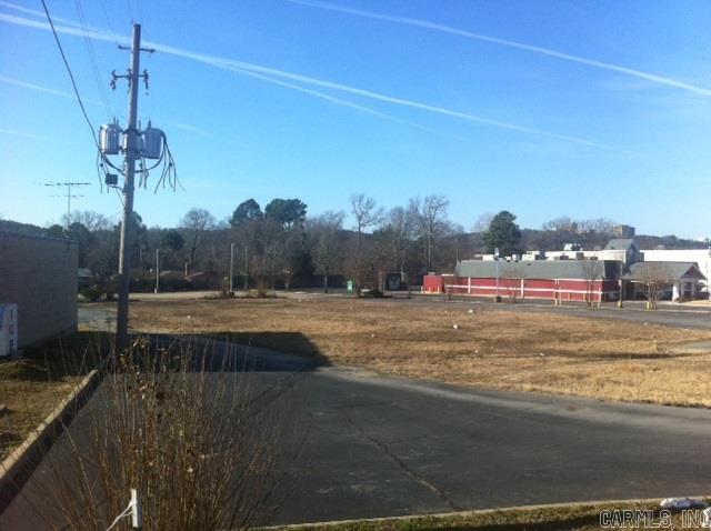 Great commercial location beside Red Lobster & other businesses 1.62 acre building lot commercial, 125 foot road frontage on Rodney Parham plus driveway from Sunneymeade Dr., excellent fast food, casual dining, strip center potential, pharmacy location. Sq. Ft. approx. measuring encouraged.