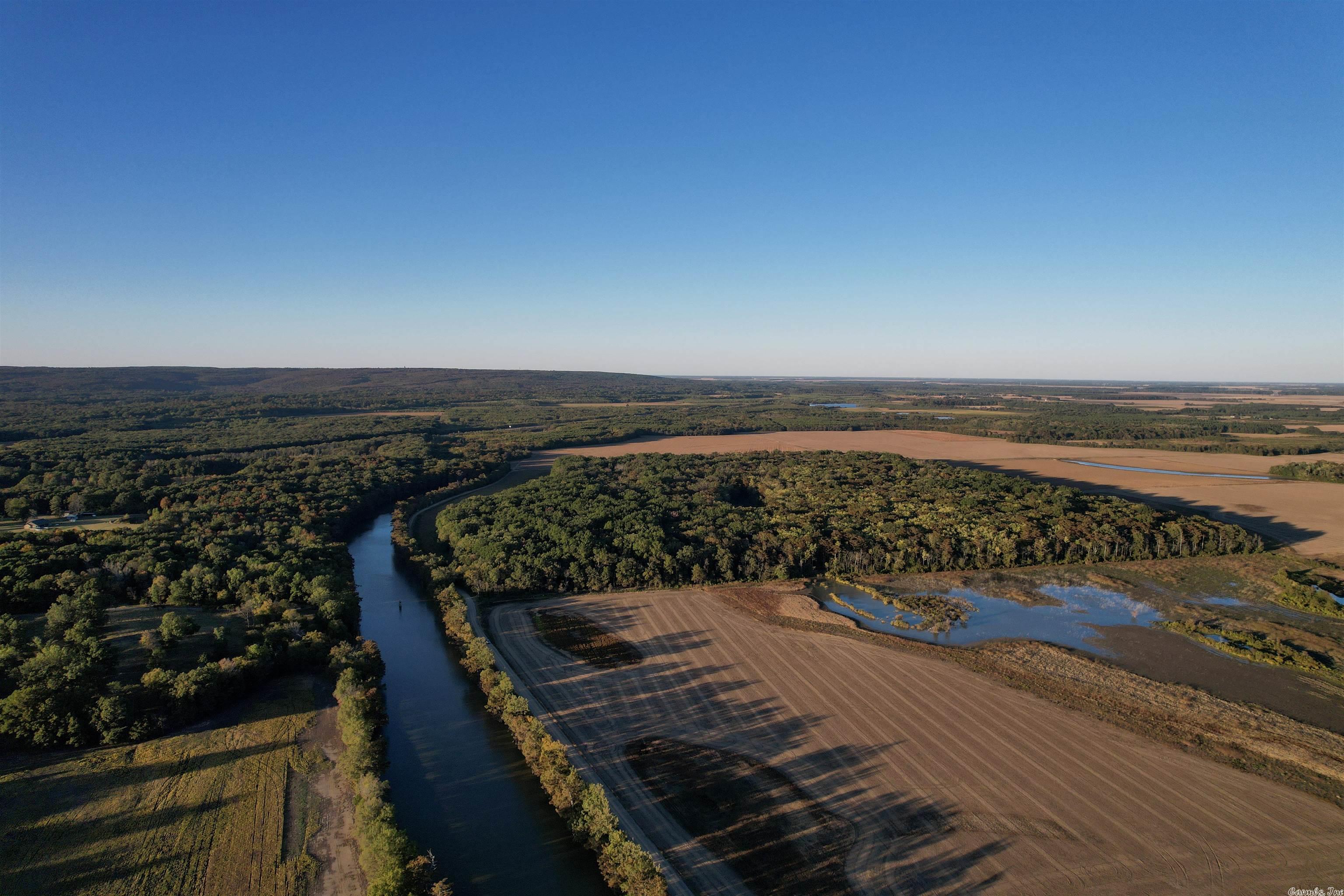 Now's your chance to own a rare tract of flooded timber in the famous Bradford Bottoms, where thousands of ducks winter. This timber tract will flood naturally from the White River.  Owned by the same family for over 100 yrs.  The Departee Creek separates +/- 20AC from the +/-160AC.  The 20 acre parcel sits on high ground, perfect for a hunting lodge or homesite.  Property is 2.9 miles from the White River, 5.2 miles NW of the renowned White Oak Duck Woods. Mineral Rights Convey. Call for your showing.
