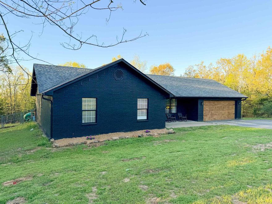 Terrific updated home on a spacious 3-acre lot just 5 miles from Greenbrier. This home has an open-concept living area and in the kitchen, there are lots of cabinets, a big apron sink and new quartz countertops. Behind the the kitchen is a separate laundry/mud room with walk-in pantry. Master suite has a walk-in closet as well as a jetted tub in the ensuite bathroom. Updated hardware and fixtures are throughout the home. The property is beautiful and has lots of shade. There is a covered back deck and a roomy fenced-in back yard. Walk past the fence, and you'll still have plenty of room to roam in the woods. A wet-weather creek runs through the woods the east side of the house. Starlink satellite will convey to new owner.
