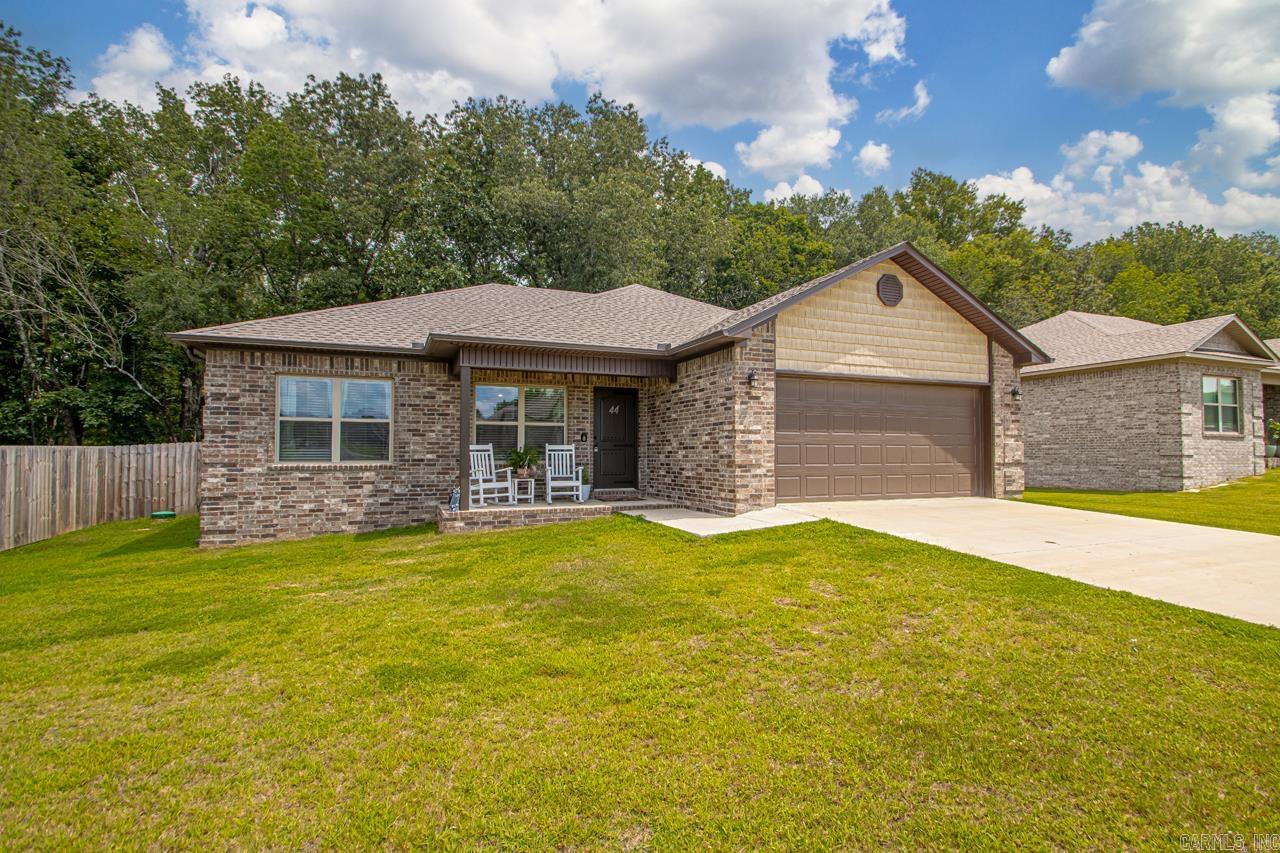 Move-In Ready in the Highly Sought-After Cabot School District! Welcome to this charming 3-bedroom, 2-bath home situated on one of the largest lots in the neighborhood! You'll love the expansive, fully fenced backyard—perfect for giving kids room to play and enjoy the outdoors. Inside, you'll find a spacious living room, a beautifully appointed kitchen with granite countertops, and ample cabinet space to meet all your storage needs. Unwind on the covered back patio and enjoy the peaceful view of the woods behind the property—ideal for relaxing evenings after a long day. With easy access to Hwy 67/167 and just a short drive to Little Rock Air Force Base, this home offers the perfect blend of small-town tranquility and big-city convenience. Don’t miss your chance to own this beautiful home in a fantastic location—call today to schedule your private tour!