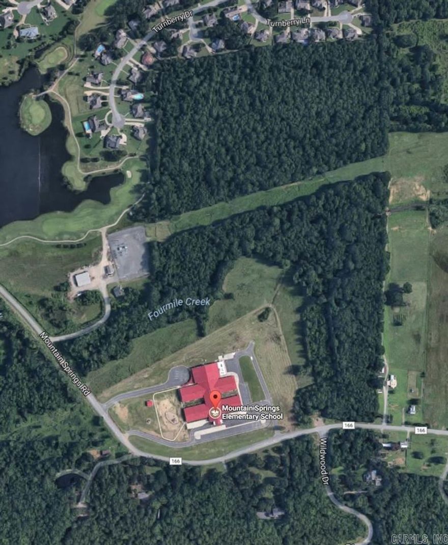 54 Acres beside and behind Mt Springs Elementary also adjoins Greystone Properties.  Great property for personal privacy or development.