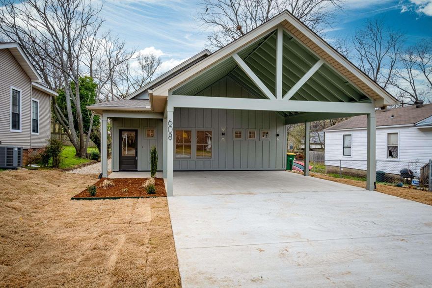Step into the charm of historic Capitol View/Stifft Station with this charming new construction residence that seamlessly blends modern amenities with timeless appeal. Situated in this coveted neighborhood, this home offers a rare find with its two-car covered parking, providing convenience and protection from the elements.  The open floorplan invites you into a world of comfort and style, highlighted by a vaulted ceiling that adds a sense of spaciousness and airiness. The custom soft-close cabinets, high-end lighting, and hardware elevate the kitchen to a chef's delight, while the split floorplan ensures privacy and functionality.  Spacious master suite, complete with a walk-in shower and a generously sized closet that caters to all your storage needs. The expansive laundry room offers ample storage and hanging space for clothes.  Step outside to the big covered porch, perfect for enjoying the outdoors and entertaining guests. The huge backyard provides endless possibilities for outdoor activities and relaxation, making it an ideal retreat for families and friends.  Come and see for yourself the perfect blend of modern living and historic charm!