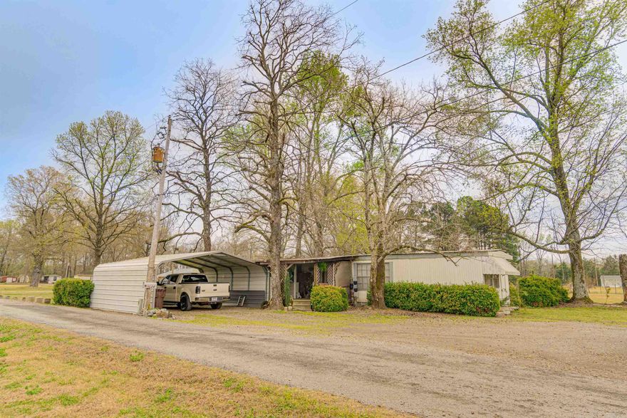 This charming 3b/1b home sits in a prime time location! Just a few minutes north of Morrilton city limits off highway 9, walking distance to a general store, 4 miles to the college university in Morrilton, and 5 minutes from the Overcup lake boat ramp/bait shop. Tucked away in a quiet neighborhood; the property features a large covered front porch, metal roof, brand new water heater, carport, storage shed and fenced in back yard. The home has been well kept, but could use some TLC and is being sold as is- making it an excellent investment opportunity with increasing demand in an area that rarely comes available!  ***Agents, please see remarks for additional notes and scheduling.