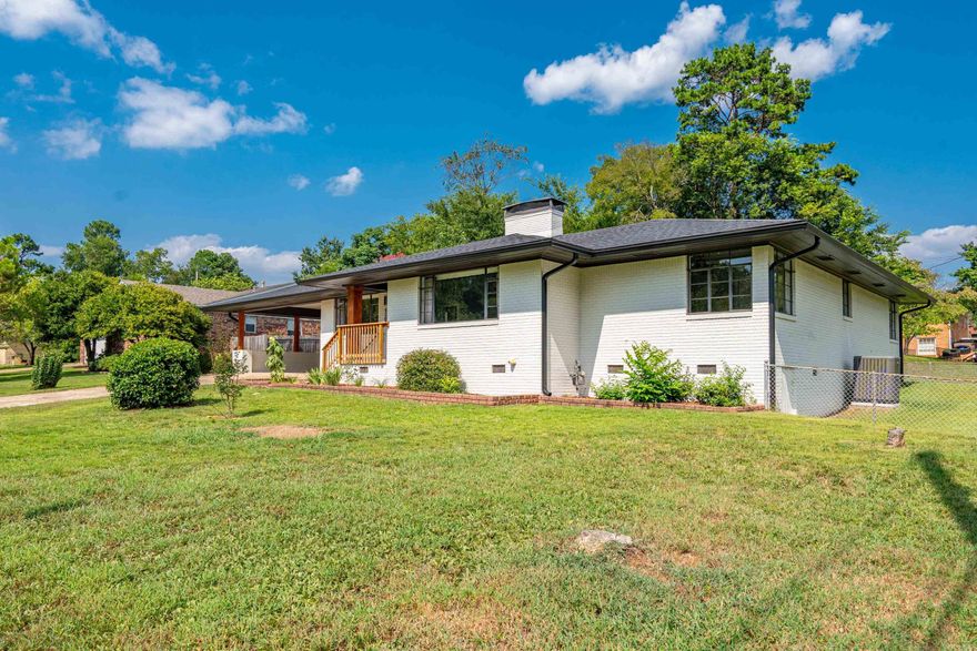 THIS LOVELY 4 BEDROOM 3 BATH FAMILY HOME sits on a corner lot in a very nice residential area!  Interior and Exterior was totally redone with modern finishes from top to bottom!  The roof and central heat/air are recent; the kitchen offers new cabinetry, countertops & backsplash with newer stainless steel appliances; new luxury vinyl plank flooring throughout; and totally updated bathrooms and laundry room.  Square footage includes two Living Areas with fireplaces, and a Dining Room.  From your back door you exit to a covered patio and a level, fenced back yard for your children and pets and an 8 x 8 storage building for yard equipment.  This central Hot Springs area is convenient to shopping, restaurants and hospitals!