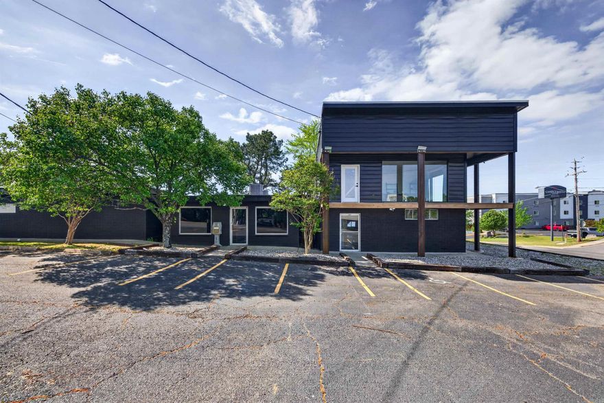 Prime commercial opportunity at 3401 Central Ave in Hot Springs! This multi-unit property has undergone numerous updates and offers three rentable spaces, making it an excellent income-producing investment. One unit is already leased, providing immediate cash flow, while the remaining spaces are ready for your finishing touches.  The standout corner unit features a unique two-story office layout with large windows, abundant natural light, and a modernized interior—perfect for a professional office, retail, or creative workspace. Additional units offer flexible layouts with updated flooring, fresh paint, and improved finishes throughout.  Situated on a high-visibility corner lot with ample parking, this property is ideally located just minutes from Oaklawn Racing Casino Resort and Downtown Hot Springs, placing it in the path of strong traffic and growth.  While some work remains to be completed, the heavy lifting has already been started—leaving tons of potential for value-add. Priced to sell, this is a fantastic opportunity for investors or business owners looking to customize and maximize returns in a prime location.