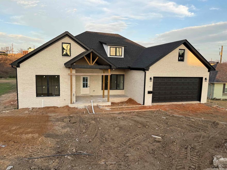 Welcome to this beautifully designed new construction home where modern style meets everyday comfort. Featuring an open-concept layout perfect for entertaining, the home includes a gourmet kitchen with quartz countertops, stainless steel appliances, and ample space for gathering. The luxurious primary suite offers double vanities, a spa-like soaking tub, separate shower, and a spacious walk-in closet. Additional features include a two-car garage, a level yard with sod to be installed, and a covered back porch ideal for outdoor enjoyment. With brick exterior complete and sheetrock installed, the home’s layout and finish are ready to be envisioned. Completion January of 2026