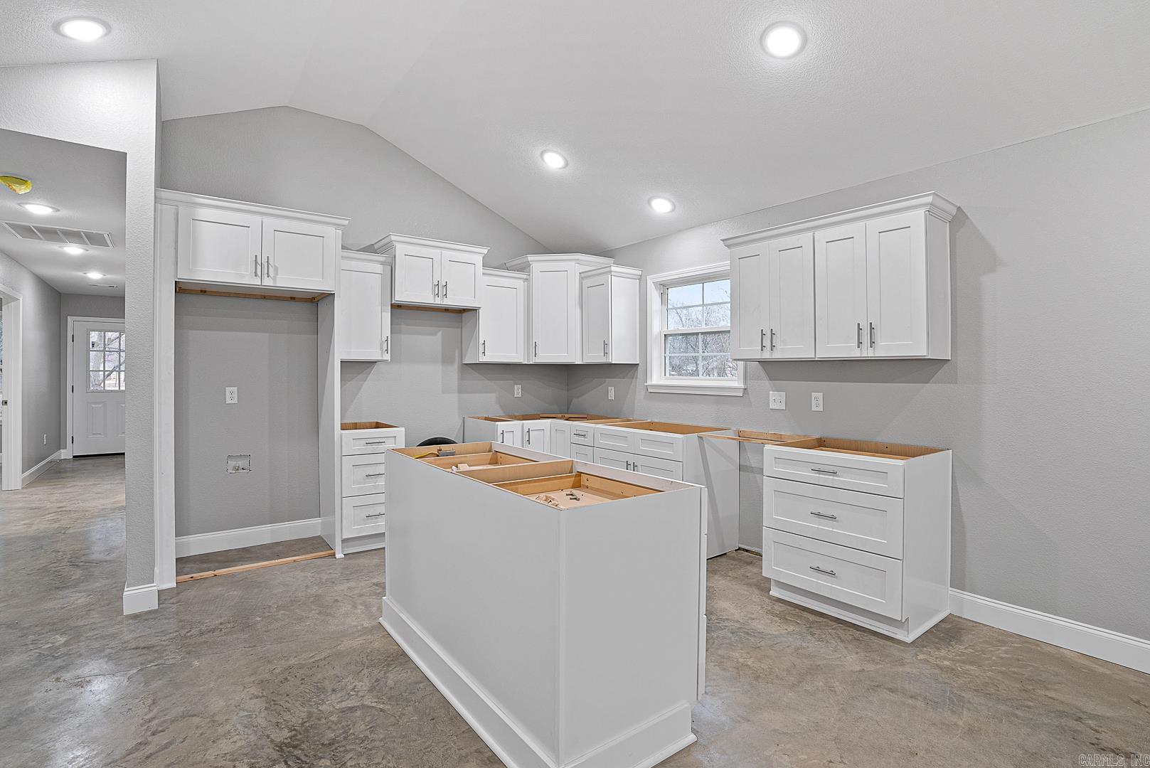 Great opportunity seven miles east of Jonesboro in the beautiful town of Lake City. This new construction is only days away from being completed. This home features an open floor plan, three bedrooms two full baths, and a spacious yard for entertaining. The home also features stained and polished concrete floors, solid surface countertops, all new appliances, and led lights throughout the home. Walking distance to city parks, water park, dog park, and disc golf course. No HOA