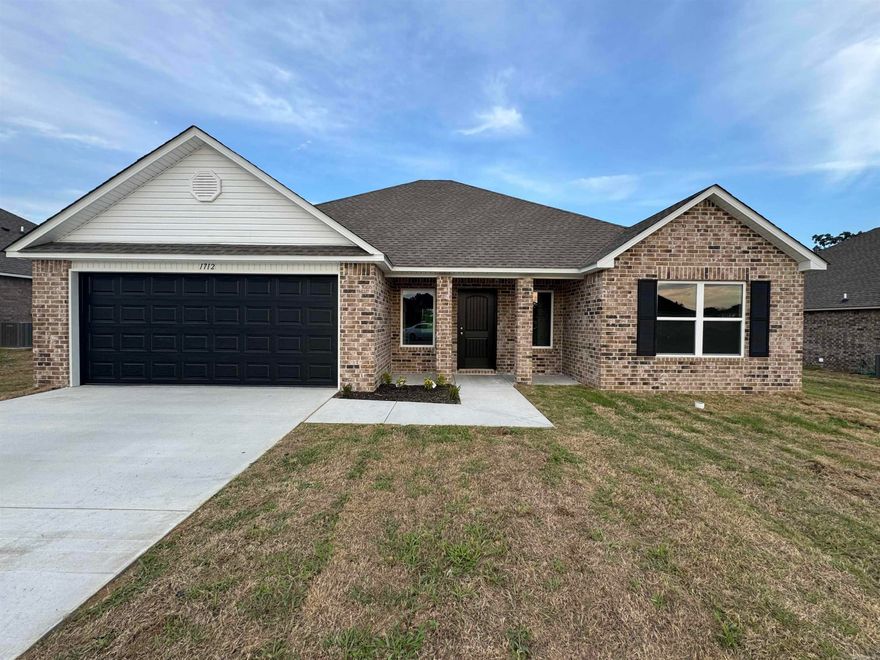 Washington plan  Upgrades: sides brick on home, 8/12 roof with architectural shingles, plumbing faucet upgrade 2, 8" deep Kitchen sink, pull out Kitchen faucet upgrade, HVAC rigid duct upgrade, cabinet hardware level 1, 16" laminate bar top in Kitchen, Luxury Vinyl Plank flooring in wet areas and Living Room and adjacent hallways, raised ceilings in Living Areas per municipal requirements, hardware upgrade to oil rubbed bronze, fiberglass exterior doors, Cheyenne style doors, baseboards level 2, LED disk lights in Kitchen, full sod, microwave hood in Kitchen, smooth top self cleaning range.        *** AGENTS PLEASE SEE SHOWING REMARKS OR AGENT REMARKS. ***  THIS HOME IS SCHEDULED TO BE COMPLETE IN MID AUGUST.