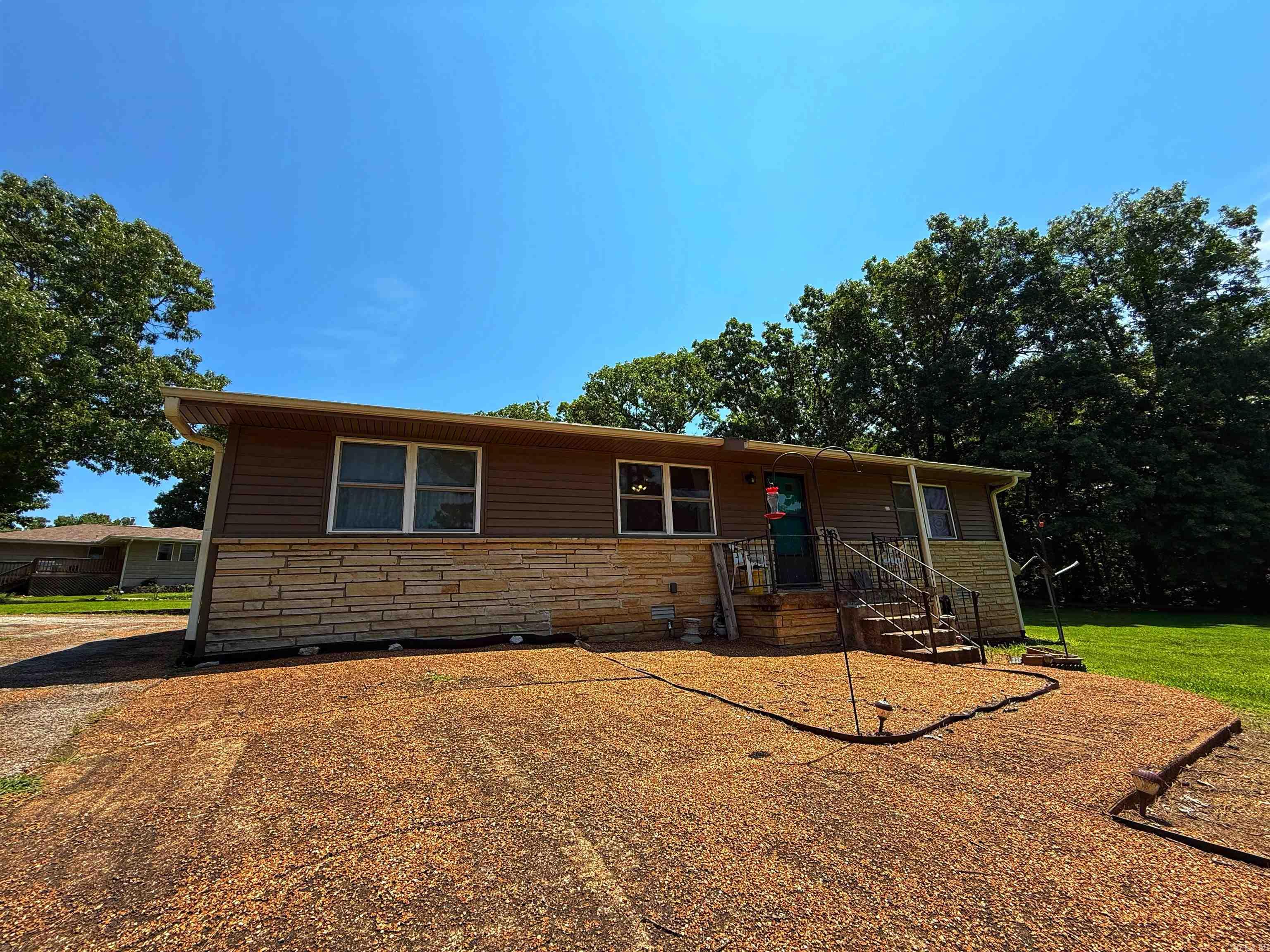 This well-maintained 3 bedroom, 2 bathroom home in Horse Shoe Bend is PACKED FULL of bonuses! For starters, potential for a 4th bedroom or make it a hobby room! You can move right into this one without hassle as it comes with all furniture & appliances that are there! Appliances include fridge, upright freezer, GE Profile washer & dryer ALL IN ONE UNIT (2024)! The seller is leaving all lawn maintenance equipment including mower, weed eater, snow blower! An AO Smith Smart Hybrid Heat Pump Water Heater (2024) gives you max energy efficiency and the whole house water filtration system (2024) offers you healthier living! The roof was replaced in 2024 & the HVAC in 2023. New one piece low flush toilets were installed in 2025. This gem near Crown Lake is just waiting for YOU!