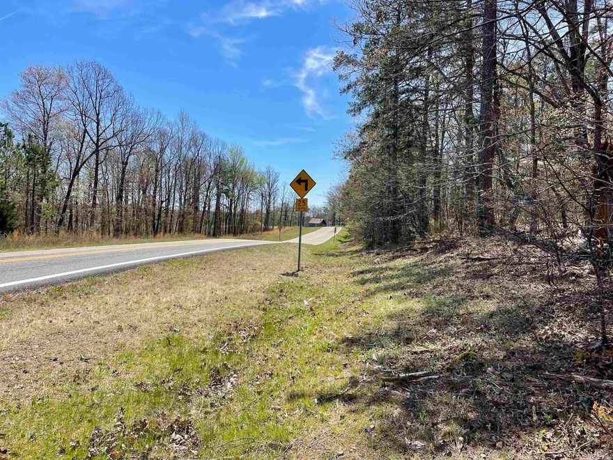 Here is a perfect recreational property loaded with large mature pine and hardwood timber that attracts and holds wildlife including deer, turkey and bear. Access this property from the HWY 16 frontage or the deeded gravel easement. Approximately 4.5 acres across the easement road would make a great building site for a cabin or home and allow the remaining acreage to be used as a recreational area to hike, hunt or simply enjoy the beauty of the Ozarks. From the road, travel along a gently rising slope past beautiful rock formations and mature timber to amazing views from several directions. When you begin to explore the property you notice several wet weather springs adding to the benefits for wildlife. Pine plantations on either side of this natural timber stand provide bedding areas with trails leading onto this property. Back at the road, there is electricity, rural water and high-speed internet so being in nature does not have to be primitive. Minerals Rights owned by the Seller convey.