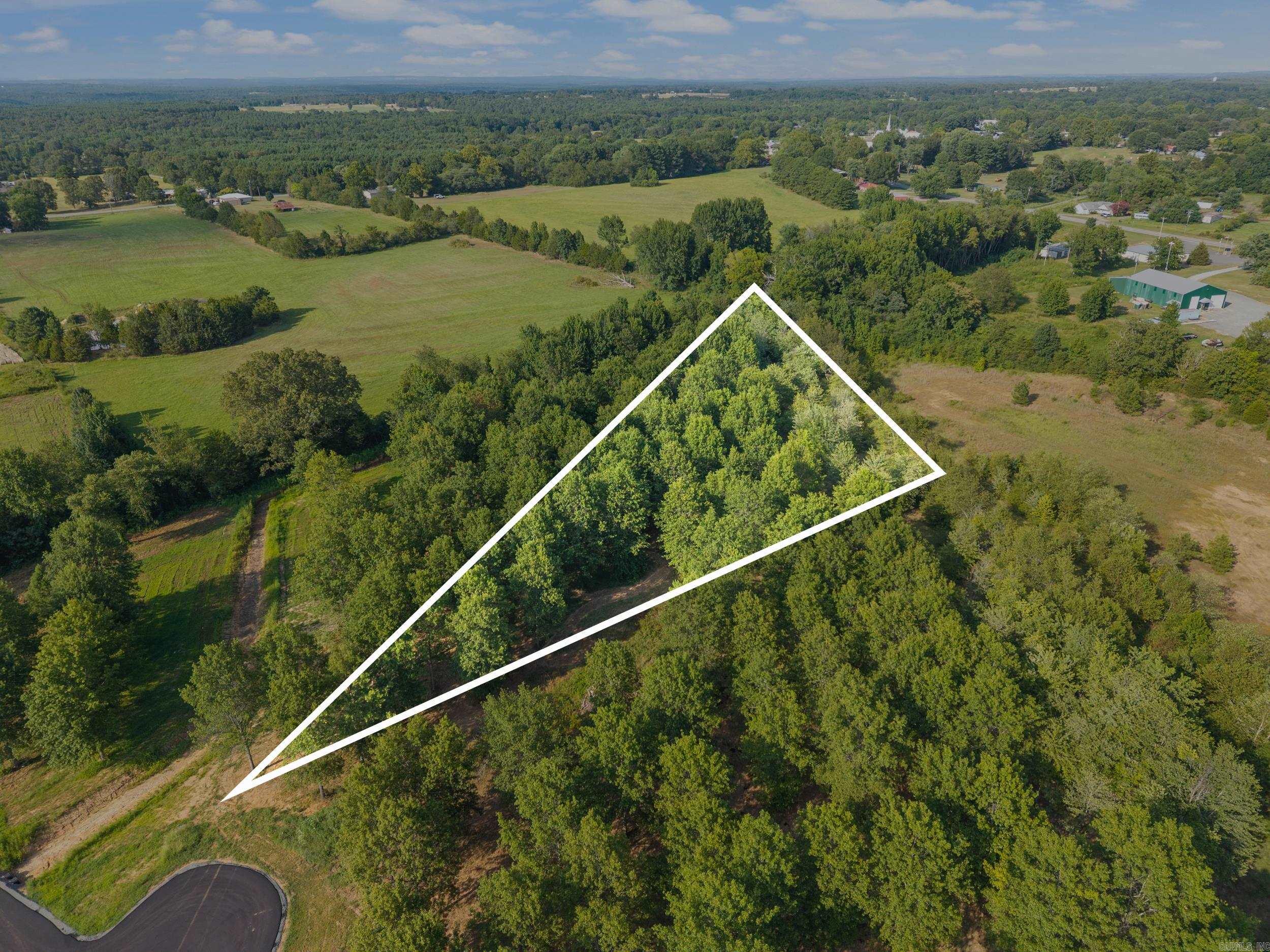 Want to live on one of the best private lakes in Arkansas? Then this is the place for you! This lot is one of the largest available on the newly opened up, Phase 2 of Win Meadow Lake Subdivision. The lot boasts plenty of room to enjoy living with your view of the sun setting across the tranquil Win Meadow Lake. This 55 acre lake offers excellent fishing opportunities and is fully stocked with trophy Largemouth Bass & Crappie. Enjoyment of the lake is limited to residents of the subdivision and their guests. There is a well-maintained boat launch and fishing access available to residents of the lake. Homes built here are subject to a few covenants to maintain a beauty and quality of living found few other places. Come check out this beautiful neighborhood today! Only a limited number of lots are left available to the public so don't expect these to last long.