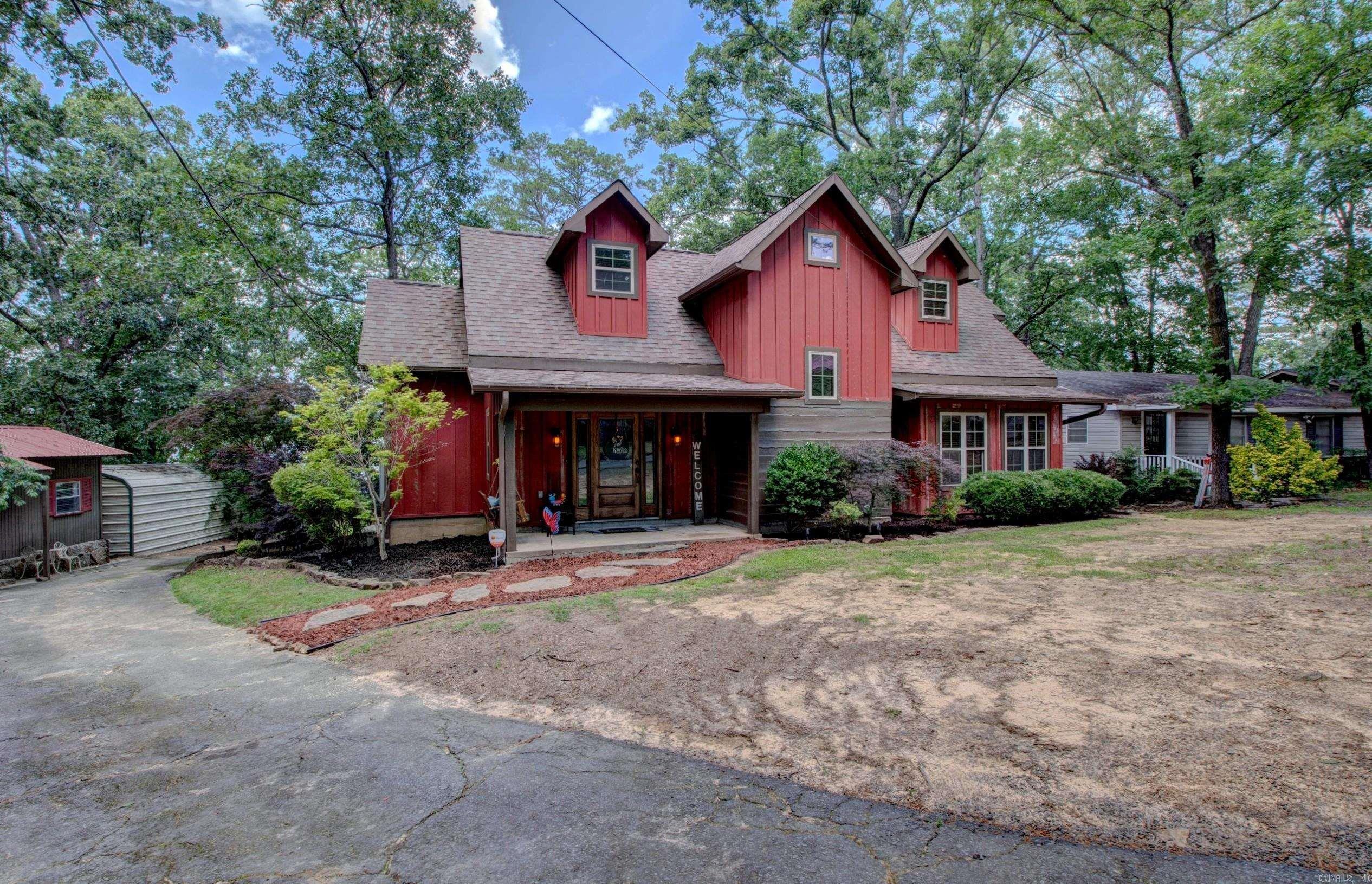 One-of-a-Kind Lakefront Property with Panoramic Views! This stunning 4-bedroom, 2-bath home offers sweeping views of Greers Ferry Lake, positioned along a low white line with its own private tram to the water. The open-concept layout features a split floor plan, a large upstairs bonus room, beautiful flooring throughout, and a wood-burning rock fireplace that adds rustic charm. The kitchen is updated with new granite countertops, stainless steel appliances, and a convenient breakfast barāperfect for entertaining. The spacious master suite boasts lake views, a walk-in closet, an en suite bath, and direct access to a screened-in porch. Step outside to enjoy the expansive covered porchāideal for soaking in those lake sunsets. Two additional furnished cabins currently operate as short-term rentals, generating over $22,000 in 2024 income. Each cabin includes a bedroom, bathroom, and kitchenetteāready for guests or extra space for family. Both completely remodeled in 2020 & 2021 Whether youāre looking for a private retreat, income property, or bothāthis is lake living at its best! Call or message me today for a private viewing Square feet includes two cabins. *Agents See Remarks*