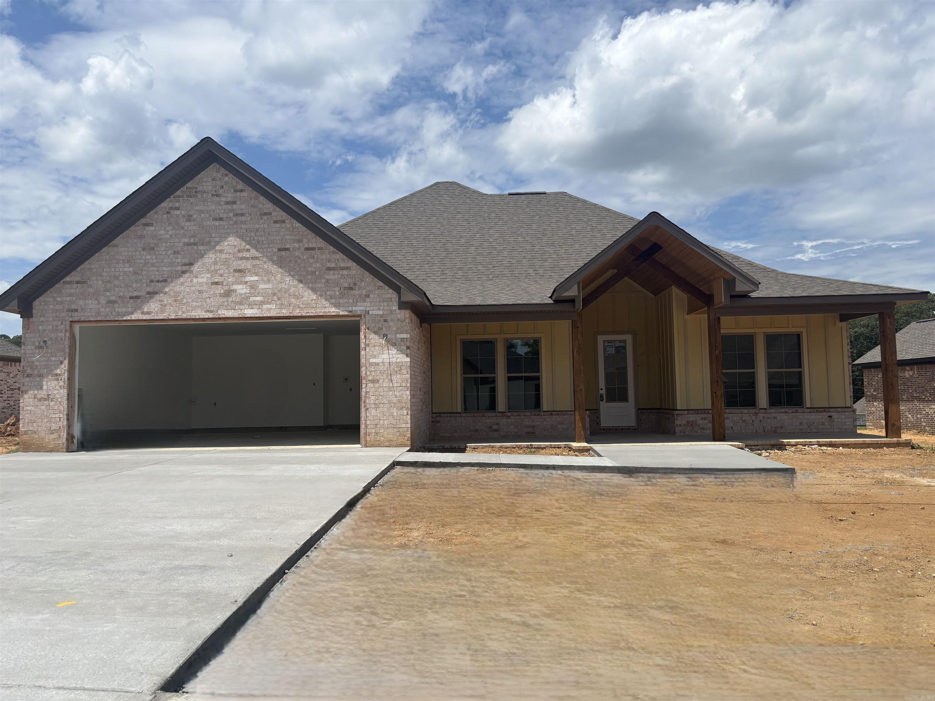 . Has extra landscaping, large covered back porch. Entry has 12 ft ceilings, Kitchen has walk in pantry with gas cooktop and wall oven, with large island over looking great room. Master has custom ceiling. Master bath has large tile shower. Homes has LVP flooring throughout.