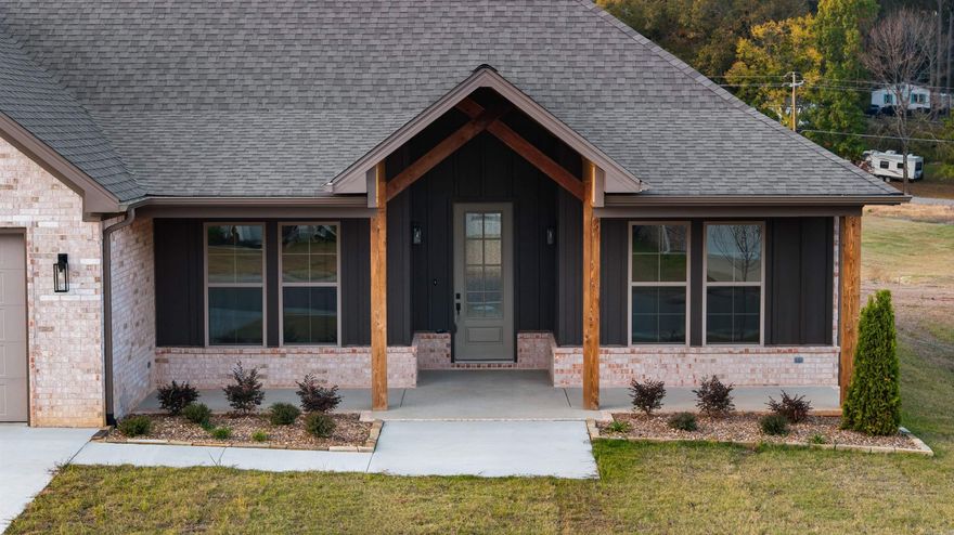 . Has extra landscaping, large covered back porch. Entry has 12 ft ceilings, Kitchen has walk in pantry with gas cooktop and wall oven, with large island over looking great room. Master has custom ceiling. Master bath has large tile shower. Homes has LVP flooring throughout.