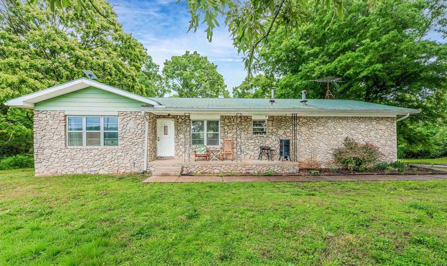 Charming country retreat on over 7 acres with a pond! This adorable 3-bedroom, 2-bath home offers the perfect blend of comfort and space to roam. Inside, you’ll find tons of cabinet space in the kitchen, newer flooring, plus an updated dishwasher and disposal. The remodeled primary bathroom adds a fresh, modern touch, and the basement (not included in the sq footage) has another full bathroom that’s already plumbed—ready for your finishing touches. Step outside and explore cleared paths winding through the property leading to the pond and a creek, creating a peaceful setting for nature lovers, outdoor enthusiasts, or anyone wanting room to spread out. Don’t miss this unique opportunity to enjoy country living with so much to offer! Refrigerator, washer, dryer, chest freezer and 2 TVs all convey with acceptable offer.