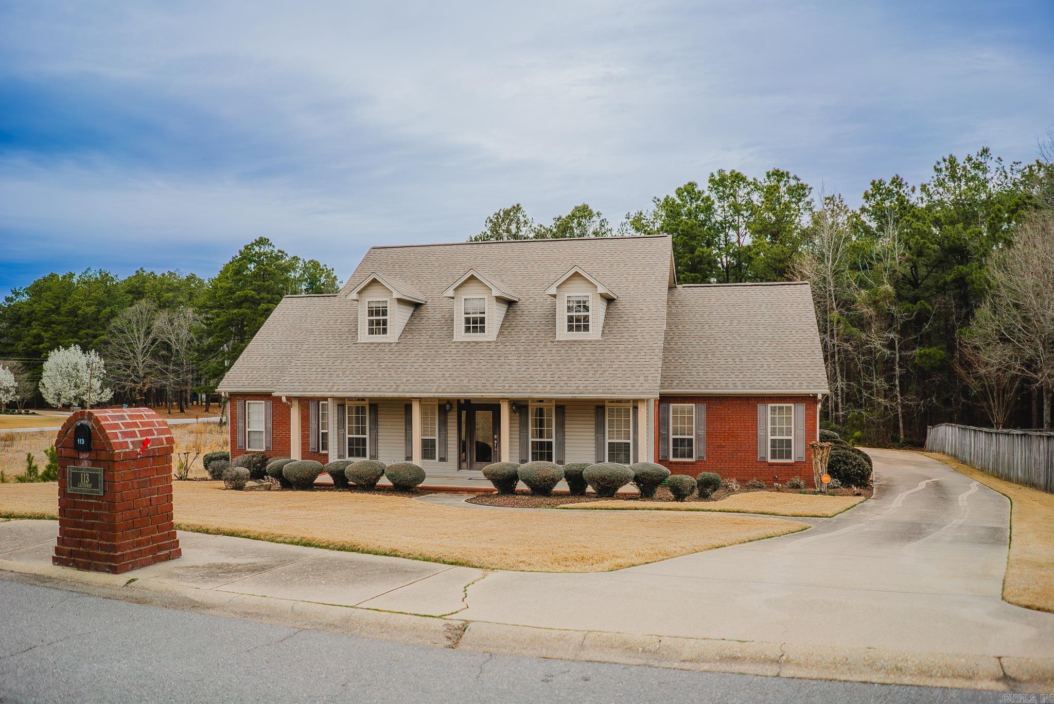 Situated on Gatesway Drive with a golf cart path to Monticello Country Club, the large front porch is the perfect welcoming spot for this classic Southern home. The downstairs portion of this 3,910-square-foot home features a large office, a formal dining room, and a living room with a gas fireplace that leads to a sunroom with wall-to-wall windows overlooking the deck and pool. The living room, sunroom, and master suite all open onto the large deck. The downstairs is completed by the well-designed, eat-in kitchen with its own exterior door access, a large laundry room with a sink, and a conveniently located half-bath. Upstairs you will find two bedrooms connected by a Jack-and-Jill bath and a fourth bedroom with its own full bath and walk-in closet. This family-friendly upstairs also features a bonus room that could serve so many purposes. The fully fenced backyard offers wooded privacy. Adding to this perfect home is a roof replaced in 2023, two NEW HVACs, and a side-load two-car garage with a separate golf cart garage. There are many more features to this home that must be seen to fully appreciate. This lovely abode is perfect for entertaining and is ready to welcome you home.