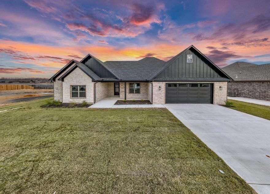 Looking for a house on the lake with all the custom features!? Look no further! Walk into the extremely open and split floor plan to see the living rooms large vaulted ceiling with custom beams and a gas fire place, all overlooking your large back porch with tongue and groove ceilings to enjoy your lake front back yard! The kitchen boasts quartz counter tops and oversized custom cabinets, along with a large butlers pantry leading into the huge separate dining room! On the primary suite side, you'll find a huge primary bath with his and her vanities and a MASSIVE closet! This home also features a tankless water heater with re-circ system, and spray foam insulation for increased efficiency! Also featuring soffit/eave lighting, gas range and utilities, and so much more! Make sure to schedule your showing today!