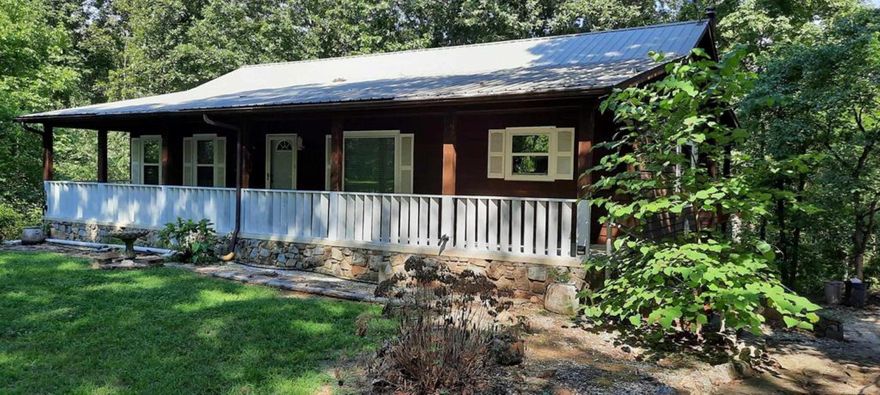 Enjoy the quiet serenity of living in the country yet you are just minutes from shopping, restaurants, music on the square, and the famous White River.  This home is large and affordable! 3 bedrooms, 2 1/2 baths, open living area on main level with 2 bedrooms, and 2 full baths, master bath has walk-in tub. Lower level offers 1 bedroom, 1/2 bath plus a large family/den. Large inviting front porch and large back deck great for entertaining or just set and relax.  Detached shop/garage, all on 3 pretty wooded acres.