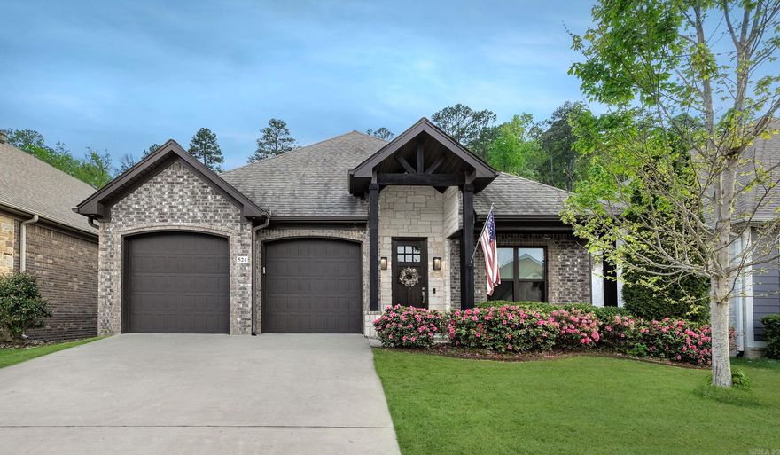 Located in desirable Wildwood Place off Denny Rd in West Little Rock, this well-maintained one-level brick home offers approx. 2016 sq. ft., 3 bedrooms, and 2 full baths. The exterior features attractive rock accents.  Inside, you’ll find beautiful LV floors in the main living areas, an office off the entry, and an open-concept living room with a gas log fireplace and cozy dining area. The kitchen includes a breakfast bar, quartz countertops, gas range, microwave, oven, and pantry. Laundry room with sink and storage is conveniently located off the kitchen. The split floor plan provides privacy, with the primary suite featuring a walk-in closet with built-ins, double vanities, soaking tub, and separate shower with a bench. Enjoy the fully fenced backyard with covered porch and fire pit—perfect for relaxing or entertaining. Neighborhood amenities include a pool and playground.