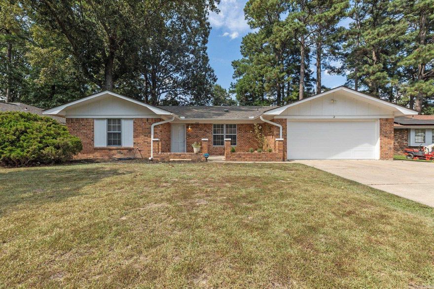 This charming 3-bedroom, 2-bathroom home spans 1,591 square feet and is situated in an established and quiet neighborhood. This home offers a large, inviting family room perfect for gatherings and cozy nights by the wood-burning fireplace. The main bedroom is generously sized and has a walk-in closet.  Throughout the home, you'll find plenty of storage solutions, ensuring your living space remains clutter-free. Step outside to a covered patio, to relax or entertain, rain or shine. This home boasts an excellent location with Walmart and a variety of shopping options just a mile away.  Enjoy dining at nearby eateries such a Chick-Fil-A and Chilis a 3 minute drive from your doorstep.  For outdoor enthusiasts, a peaceful walking trail is only a half mile away, offering a serene escape close to home.  Don't miss out on the opportunity to make 1403 Silver Fox Lane your personal sanctuary.