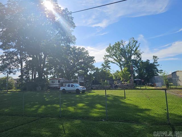 Great Lot to build your perfect home. Property will need to be cleaned up. Utilities are on property (water, septic, city sewer available and natural gas)