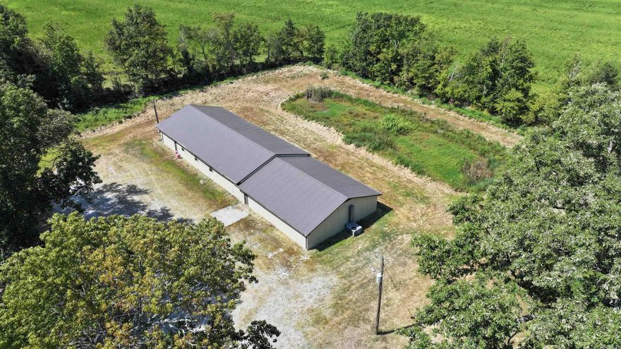 Low maintenance waterfowl lodge located in the small community of Fair Oaks, Arkansas. This location places you in the heart of waterfowl country whether you own land nearby, lease a few farms, or hunt some of Arkansas' public lands.  Listed at just under $57/ft2 you will struggle find an existing camp this nice or build one in this price range. Inside, it has been fully renovated with little to no use since the project was completed. The large, commercial Motak gas range and ovens convey and will easily prepare the largest meal you could imagine. It has 6 bedrooms (9 bunks for a total of 18 beds included) and 4 full baths so that you can give each member their own room and bathroom if you have a small group or easily sleep well over 20 people if you have a big crew. The living area is spacious with all furniture and pool table pictured conveying with plenty of extra room to make any type of entertainment space you desire. The exterior measures 110'x34' and is all metal, including the roof, making it a very low maintenance property to help keep your annual expenses and effort low. There is small pond behind the structure.