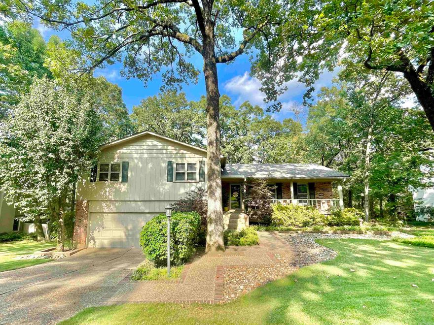 Nestled in cul-de-sac is wonderful family home.  Open concept on main level lets you enjoy living and dining space highlighted by a fabulous kitchen with updated cabinets, granite countertops, large island, bkft bar, SS appliances, pantry and door to one of three decks.  This multi level home gives space for everyone - 4 large bedrooms on upper level (one ensuite).  Downstairs has second family room w/wbfp w/gas logs (w/remote starter), Lg Laundry and 1/2 bath.  A few steps down take you to very large primary suite w/bathroom w/dbl vanities, shower and closets.  Amazing storage inside and under the house.  Decks are off three levels and over look flat backyard that has a concrete pad for basketball.  Sprinkler system - front & side yard. Updates:  All windows replaced - 2021, Roof - 2022, HWH - 2024.  This is a must see home with 2 living area, 5 BR's 3.5BA  just off Pleasant Valley Dr! See Confidential Remarks