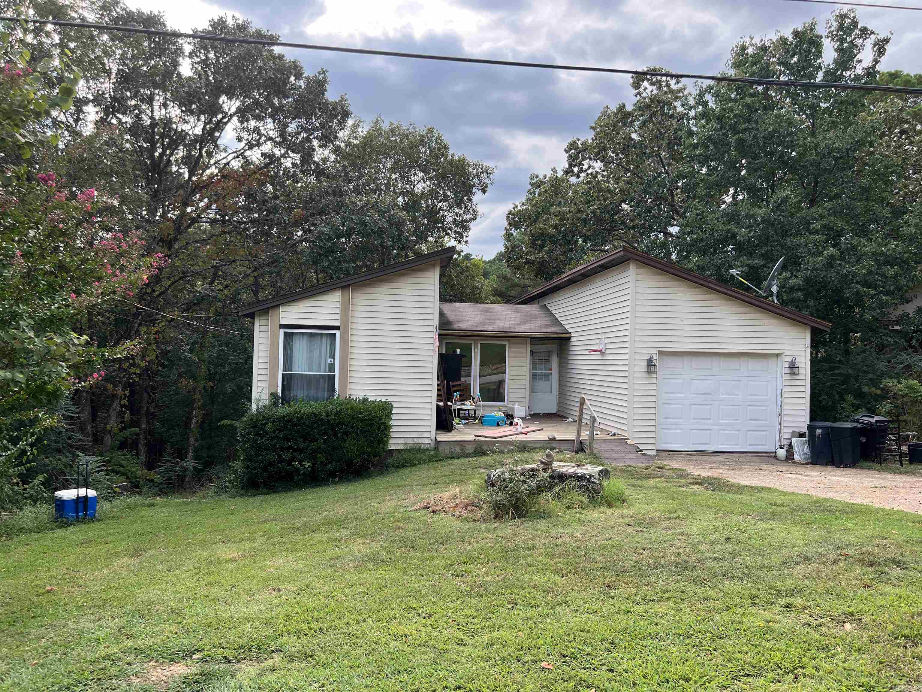 This home is just minutes to 92 miles of ATV trails, pickleball, putt putt golf, two golf courses, 3 swimming pools, hiking trails, all area amenities and Greer's Ferry lake! Come take a look!