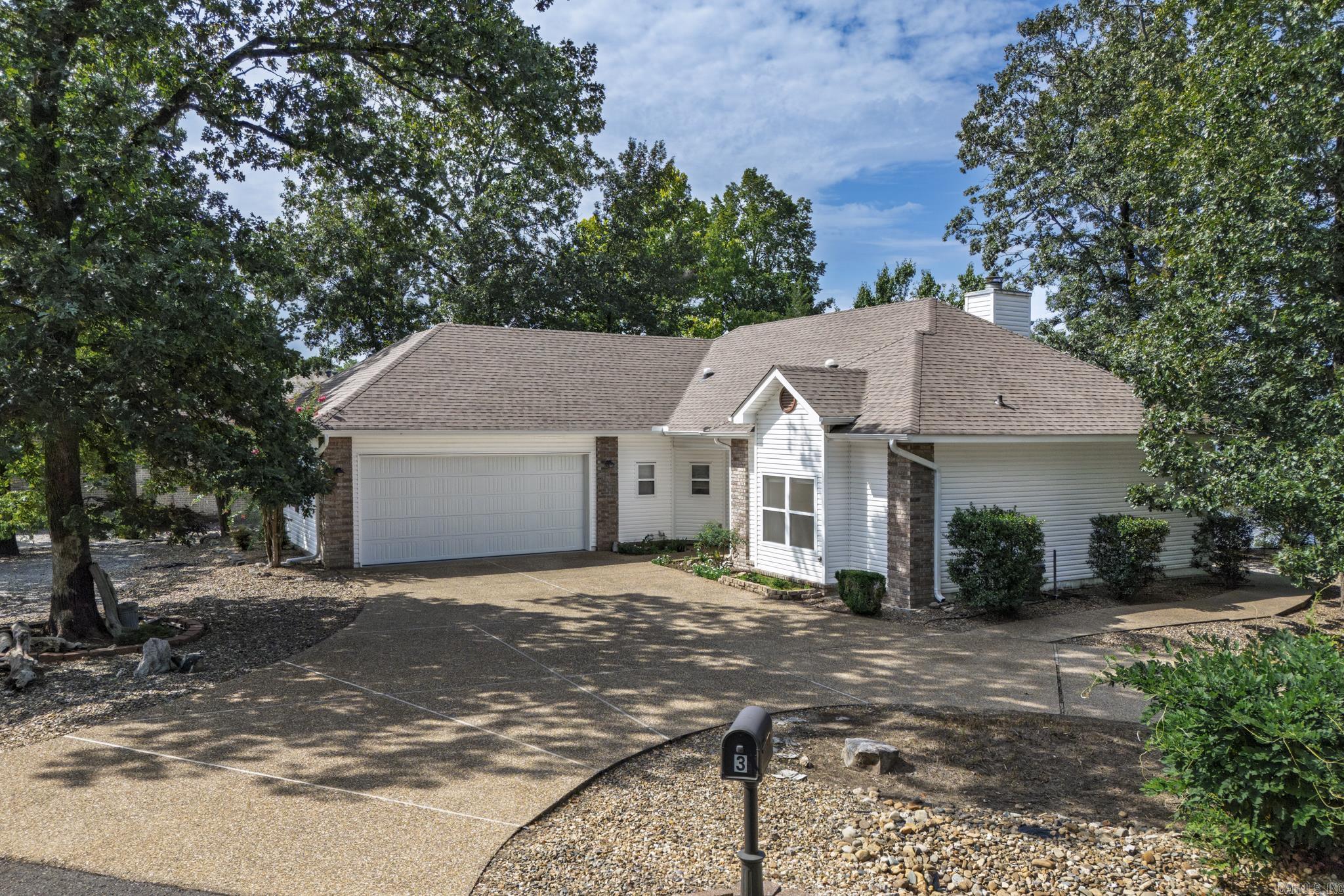 Welcome to your lakeside retreat on the desirable east side and Lake Sophia! Nestled on a level lot in a peaceful cove, this 3-bedroom, 2-bath home offers comfort and convenience. Split master layout, vaulted ceilings in the living, dining, and kitchen areas create an open, airy feel. Enjoy hardwood floors in the great room and newer stainless-steel appliances in the kitchen, with refrigerator included for move-in ease. Eco-friendly features abound with geothermal heating and cooling, solar panels, and an EV charging station in the spacious 2-car garage. A covered boat dock makes lake days effortless, and the standalone screened in porch is perfect for stowing water toys. The roof has been recently inspected, offering peace of mind. Whether youāre seeking a full-time residence or a weekend getaway, this property combines modern efficiency with the tranquility of lakeside living. Donāt miss the chance to experience Lake Sophia living at its finest!