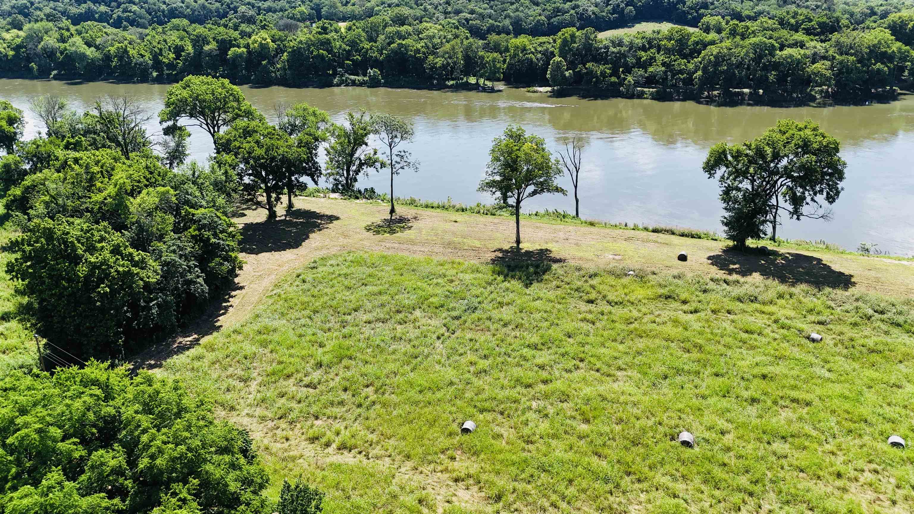 Escape to 1.28 acres of recreational heaven on the White River. This secluded lot sits at the end of a quiet gravel road and features breathtaking bluff views, direct river frontage, and a private boat launch—ideal for fishing, kayaking, and floating. Whether you're looking for a weekend getaway, a peaceful campsite, or a future cabin site, this property offers it all. Plus, fiber internet is available, combining outdoor adventure with modern convenience. A rare find for anyone seeking natural beauty and year-round river enjoyment.
