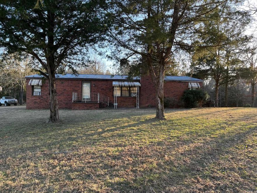 Don't miss this quiet and secluded 3bed/2bath home located in the heart of the Ouachita National Forest. Home sits on 18.5 acres with a pond and pasture for farm life. Backyard has access to the Ouachita National Forest. Minutes away from Cedar Creek with Lake access.