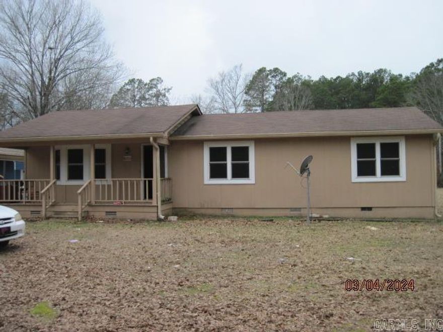 COUNTRY LIVING AT ITS BEST IN OUACHITA COUNTY ARKANSAS. LOCATED JUST A SHORT DISTANCE FROM THE PIZZA INN IN BEARDEN ARKANSAS. THIS 3 BEDROOM 2 BATH HOME.  THIS HOME HAS A SHED FOR A LARGE RV AND A SMALLER ONE FOR THE MOWERS, 4 WHEELER, AND SHED FOR TOOLS. THIS HOME HAS A CHICKEN PEN AS WELL. HOME HAS A WELL ON THE PLACE FOR WATERING THE GARDEN AND CHICKENS.