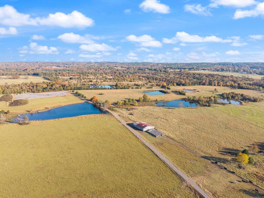 For the first time in nearly a century, this extraordinary 344± acre legacy property near Greenbrier is being offered to the market. A rare opportunity in Faulkner County, this estate-worthy tract showcases a stunning blend of rolling pasture, hardwood timber, and scenic Black Fork Creek along the Southern border of the property. With Approx 228 acres of established grazing land and nearly 116 acres of wooded terrain.- this property is fully fenced and cross-fenced with 12 picturesque ponds and this land has a proven history as a successful cattle operation. Thoughtful improvements include a Well-Maintained Hay Barn, 2 Red-Iron Equipment sheds, and Functional Cattle Working Pens. The wooded areas offer exceptional recreational appeal with wildlife, privacy, and natural beauty, while Black Fork Creek enhances the southern edge of the property with Multiple breathtaking homesite options available to provide the perfect setting for a private estate, ranch headquarters, or multi-generational retreat. Paved road frontage and easy access to nearby amenities elevate the desirability of this rare large-acreage offering. Call today to see it for yourself. No mineral rights convey.