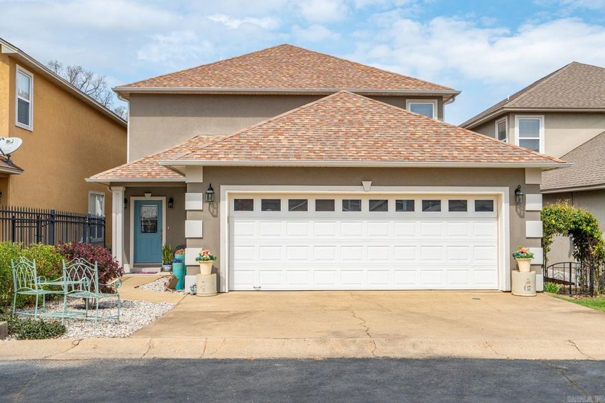 Discover the perfect blend of comfort and convenience in this stunning 3-bed, 3.5-bath detached townhome nestled in an exclusive lakefront condo community. Designed for easy living, this home is completely carpet-free, making maintenance a breeze. Each bedroom boasts its own private bathroom, with one located on the main floor for added flexibility. With two spacious living areas—one upstairs and one down—you'll have plenty of room to relax or entertain. Step out onto the deck and fire up the natural gas grill, gas hookups on both ends of the deck, while taking in breathtaking lake views. Additional features include an encapsulated crawl space with a SaniDry Sedona system to maintain low humidity levels and a whole-home generator to keep you powered up during outages. Take a stroll along the boardwalk overlooking the lake, or take advantage of the home’s prime location—just minutes from Central Ave, the bypass, and Oaklawn. The POA covers lawn maintenance, a sprinkler system, annual termite inspections, the beautifully maintained gated entrance, flower beds, and the boardwalk. Don’t miss the opportunity to enjoy lakefront living with low maintenance and modern conveniences!