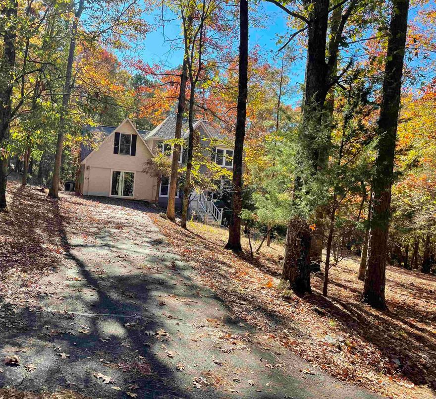 MOUNTAIN HARBOR homes are rarely available..  Come see all this home has to offer with 5 bedrooms, 3 baths and many updates including windows, carpet in bedrooms, and fresh paint AND is minutes from Lake Ouachita.  It is situated on 2 acres with wildlife to make this peaceful retreat one that will be a pleasure to own. Add your personal touch to this magnificent setting.